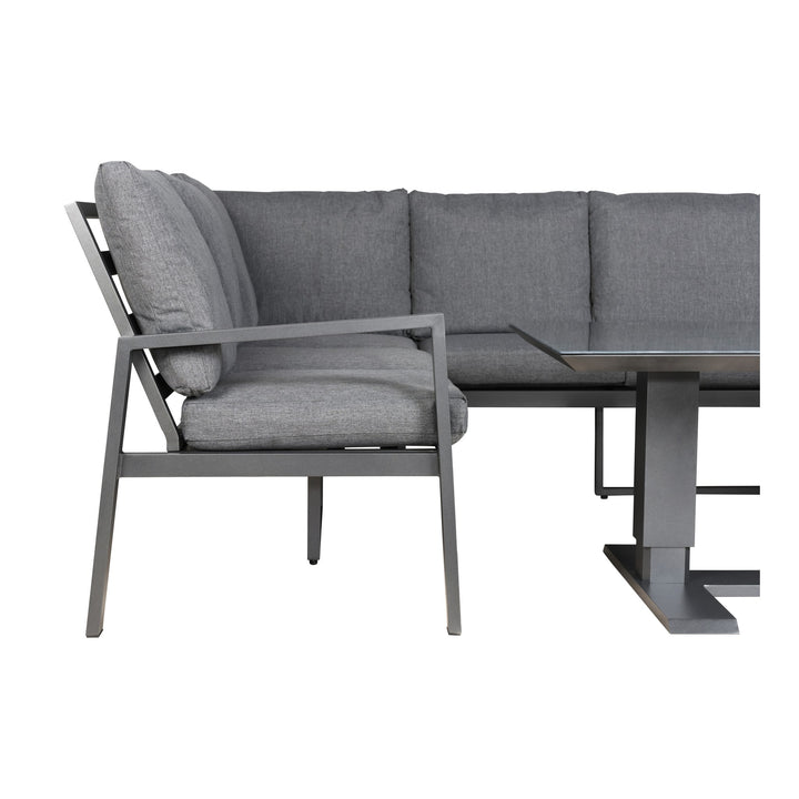 Manchester hjørnesofa i grå med glassbord, sett fra siden med sortlakkert ramme