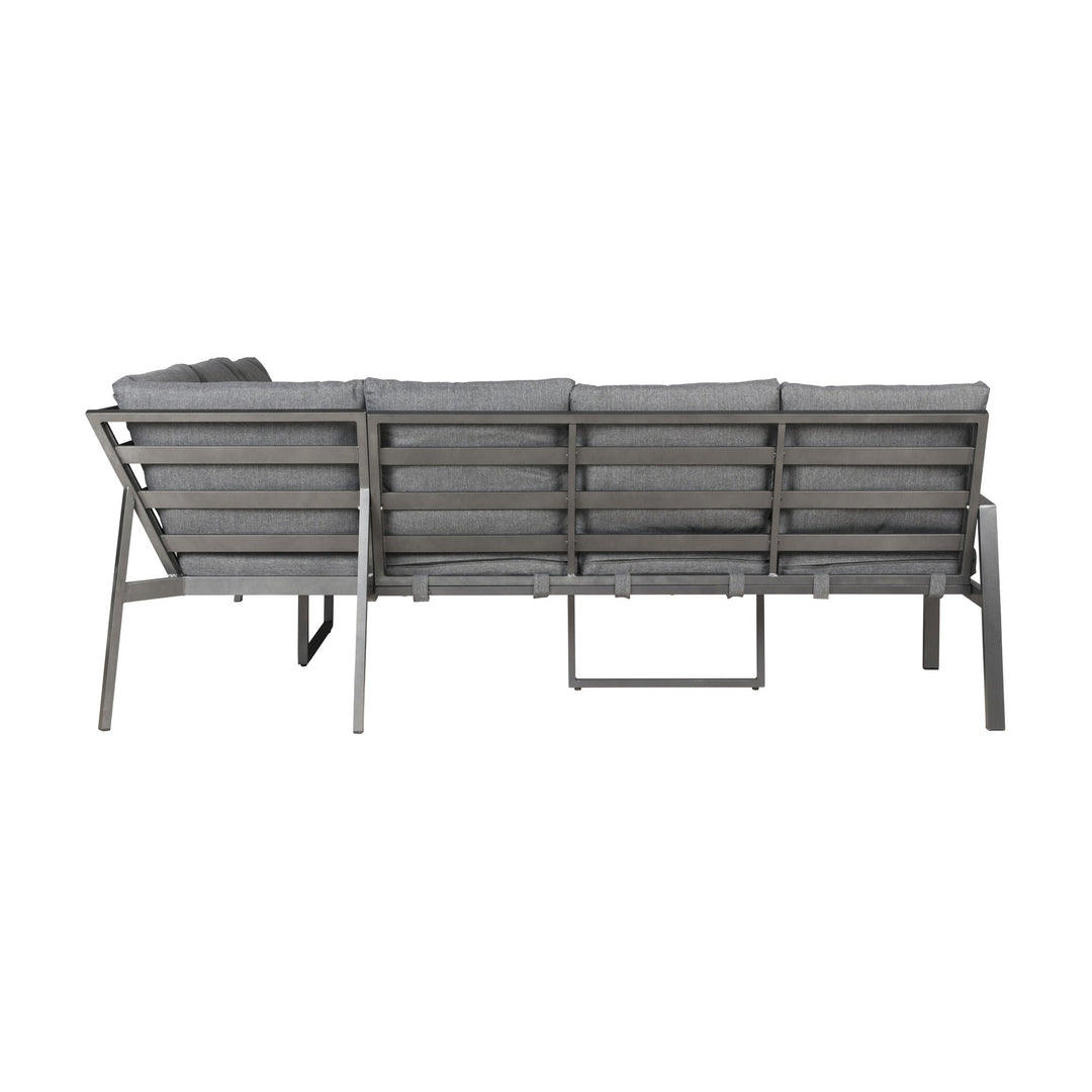 Manchester hjørnesofa i grått, sett bakfra med spilerygg i mørk aluminium