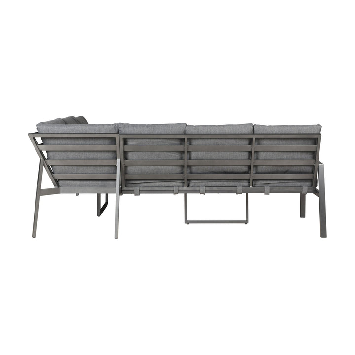 Manchester hjørnesofa i grått, sett bakfra med spilerygg i mørk aluminium
