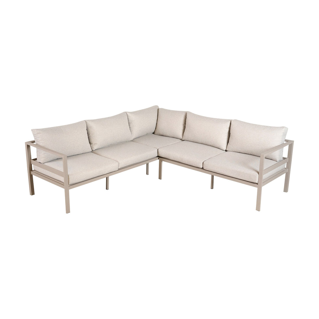 Dover loungesofa i hjørneoppsett med kremfargede puter og lys taupe aluminiumsramme.