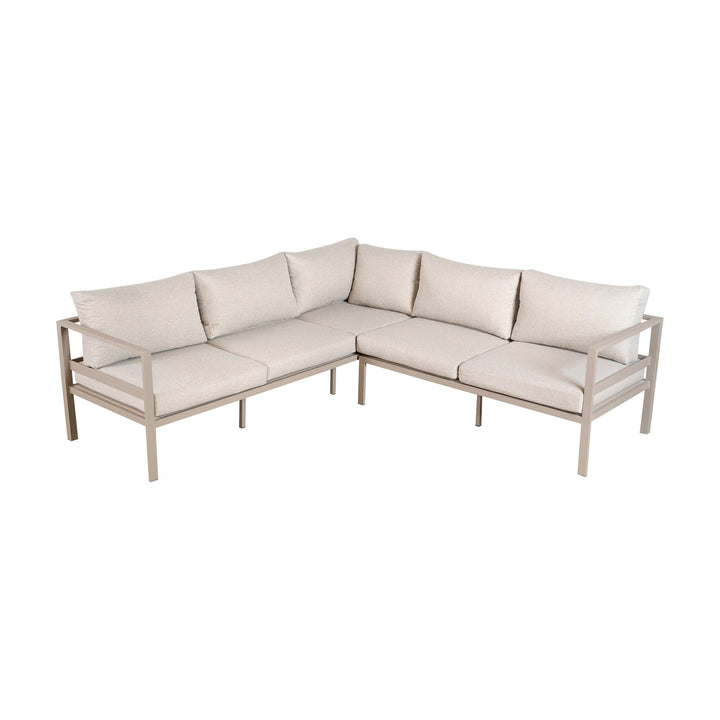 Dover loungesofa i hjørneoppsett med kremfargede puter og lys taupe aluminiumsramme.