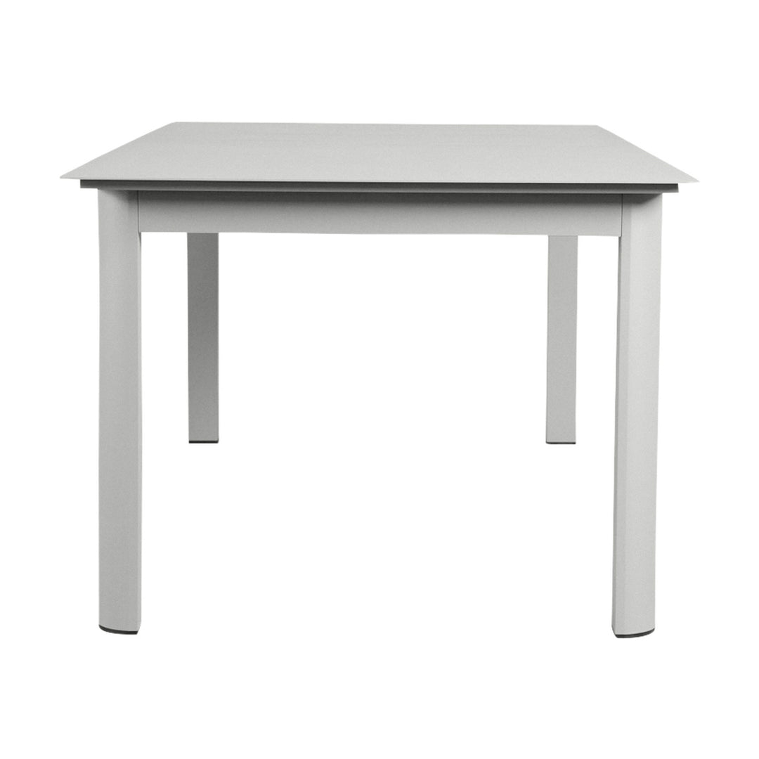 Bilbao spisebord i oyster, lys bordplate i aluminium sett ovenfra.