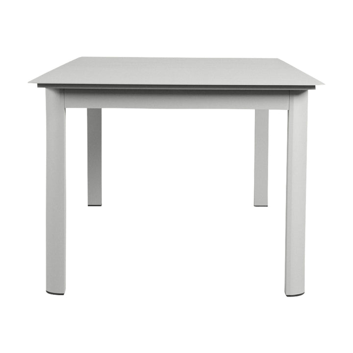 Bilbao spisebord i oyster, lys bordplate i aluminium sett ovenfra.