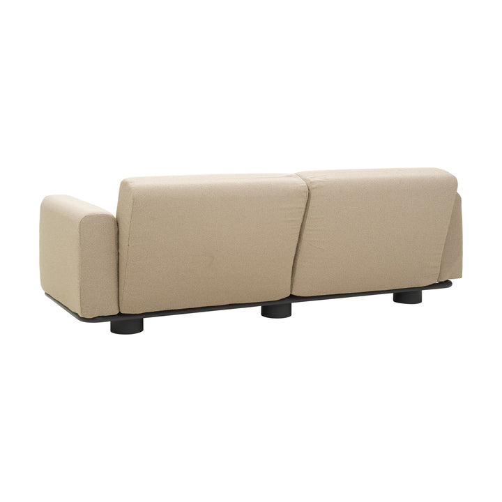 Brafab Bolster sofa i beige bouclé med sort sokkel, sett bakfra