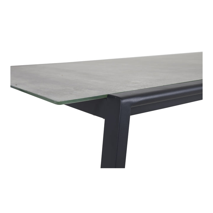 Brafab Lyra spisebord med grå keramisk plate og sort aluminiumsramme, nærbilde av kant og ben