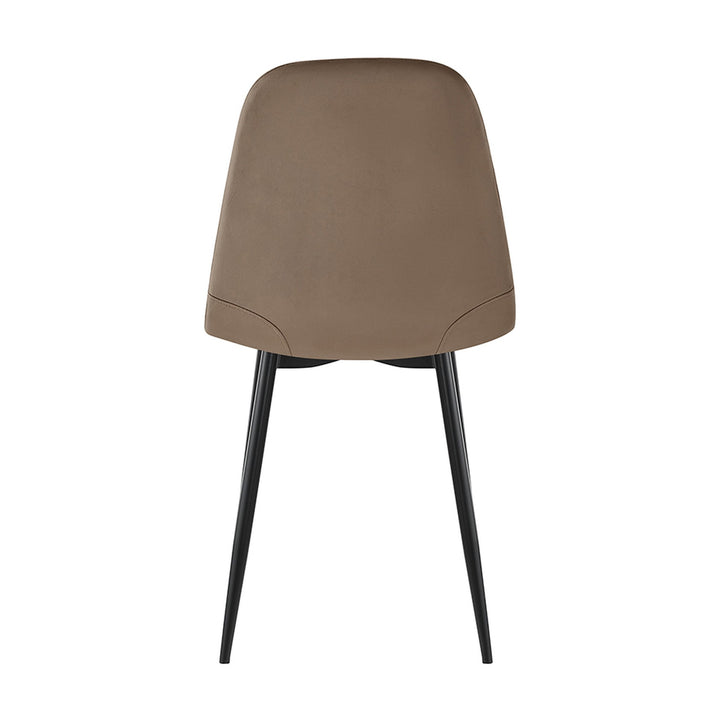 Trend spisestol i beige velur, sett bakfra med svarte, koniske metallbein