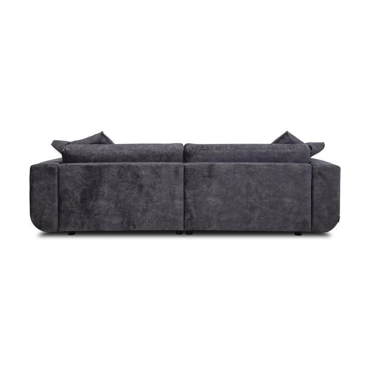 Motive sofa i koksgrå velur, sett bakfra med løse ryggputer