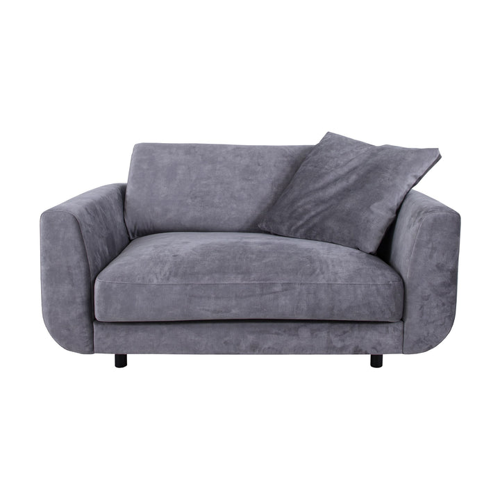 Lazy sofa i grå velur med løs pute og sorte ben