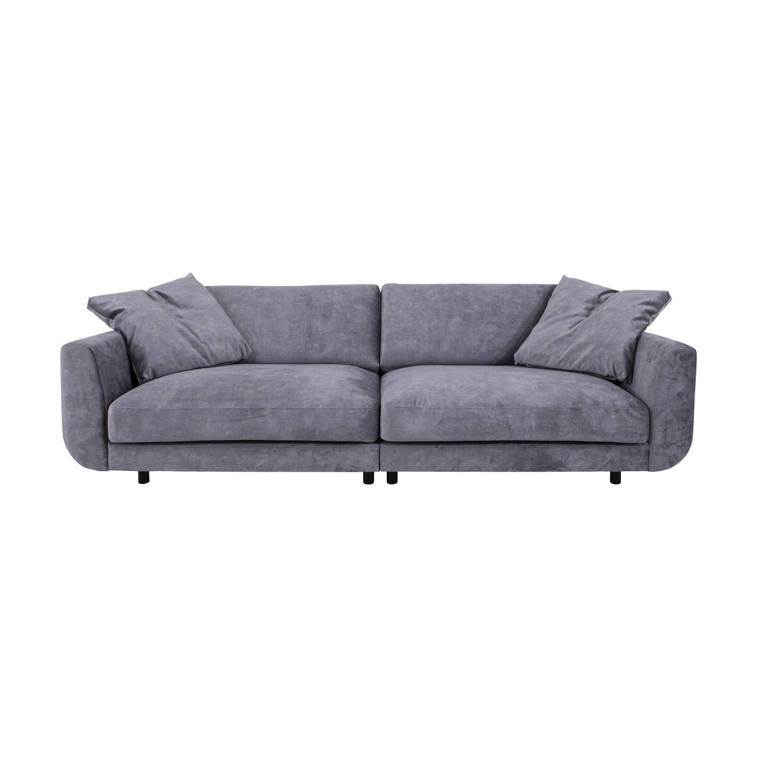 Lazy sofa i grå velur med løs pute og sorte ben