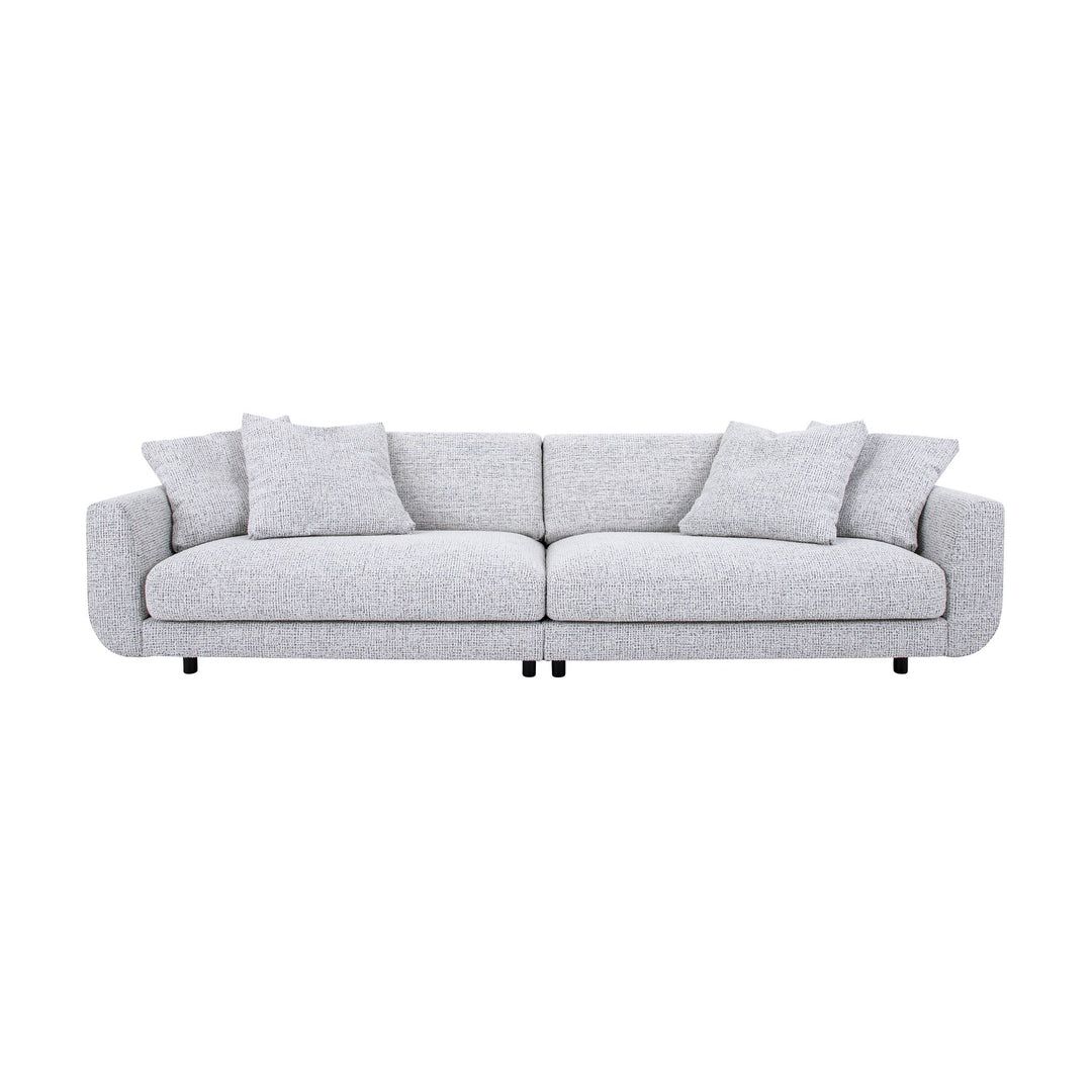 Lazy sofa i grå velur med løs pute og sorte ben