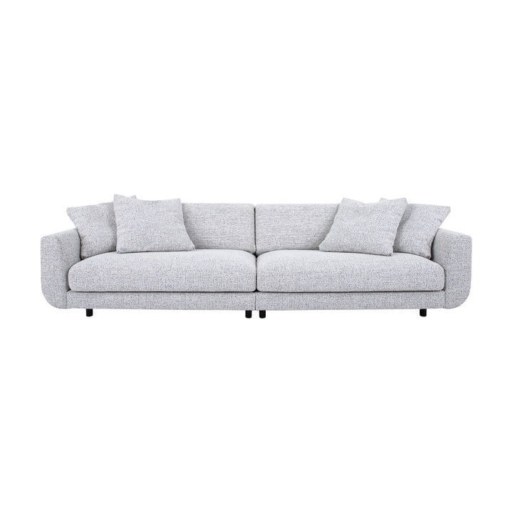 Lazy sofa i grå velur med løs pute og sorte ben