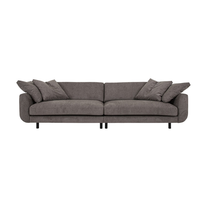 Lazy sofa i grå velur med løs pute og sorte ben