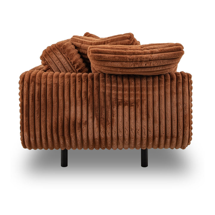 Lazy Sofa i rustbrun kordfløyel sett fra siden, med brede riller og svarte ben