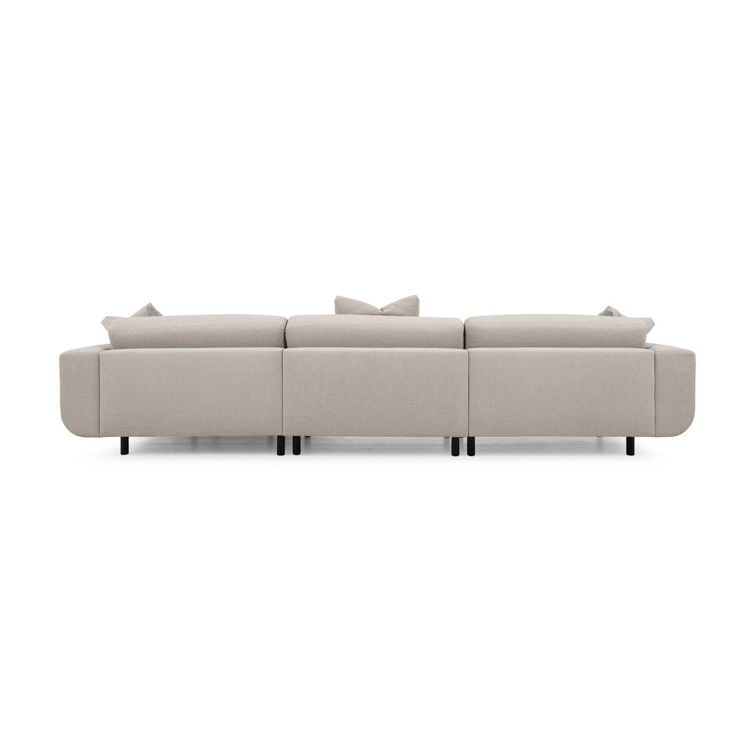 Lazy Sofa i kremhvitt stoff sett bakfra, modulsofa med svarte ben