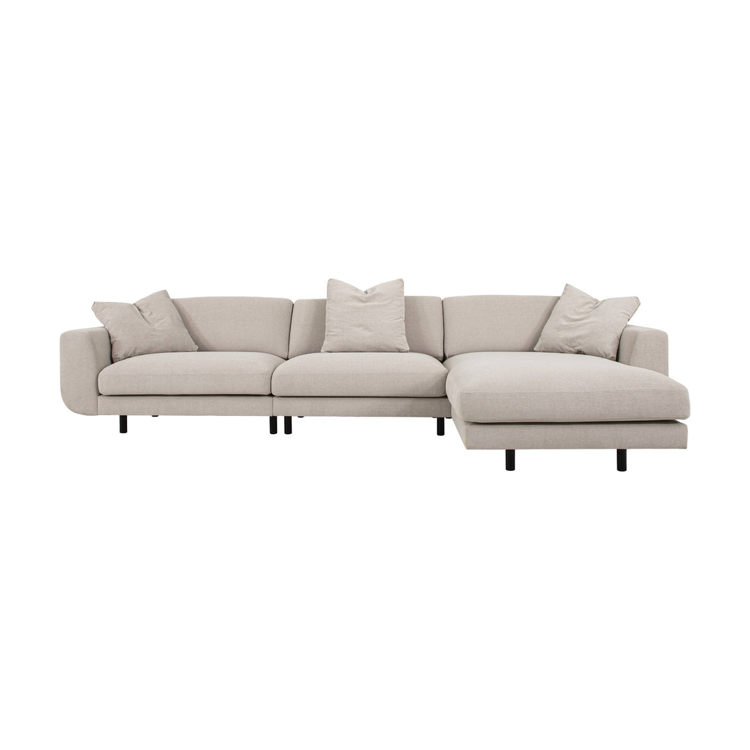 Lazy sofa i grå velur med løs pute og sorte ben