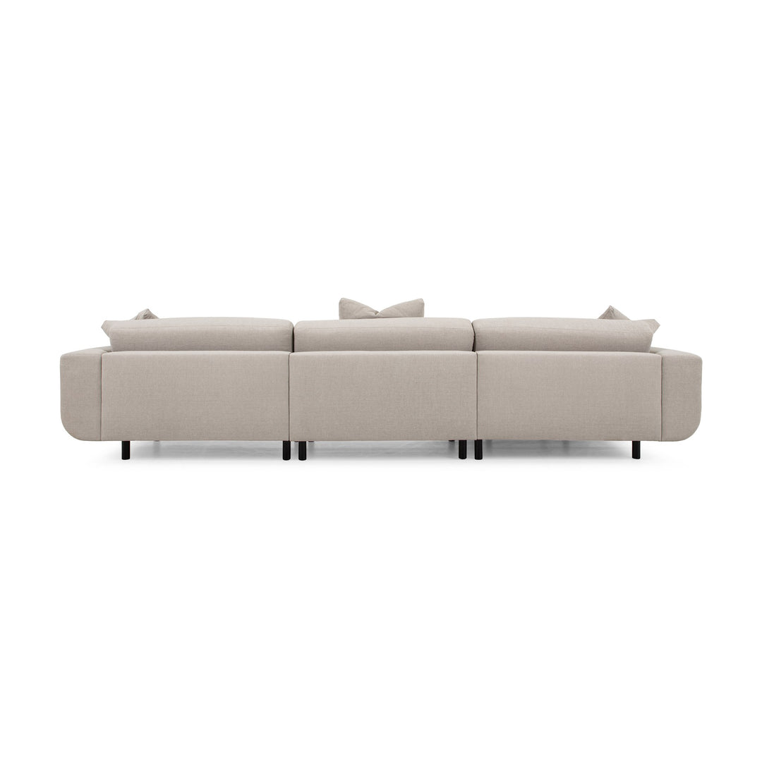 Lazy Sofa i kremhvitt stoff sett bakfra, modulsofa med svarte ben