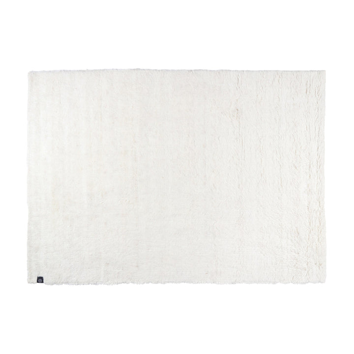 Inhouse Todi teppe i kremhvit ull med lang lugg