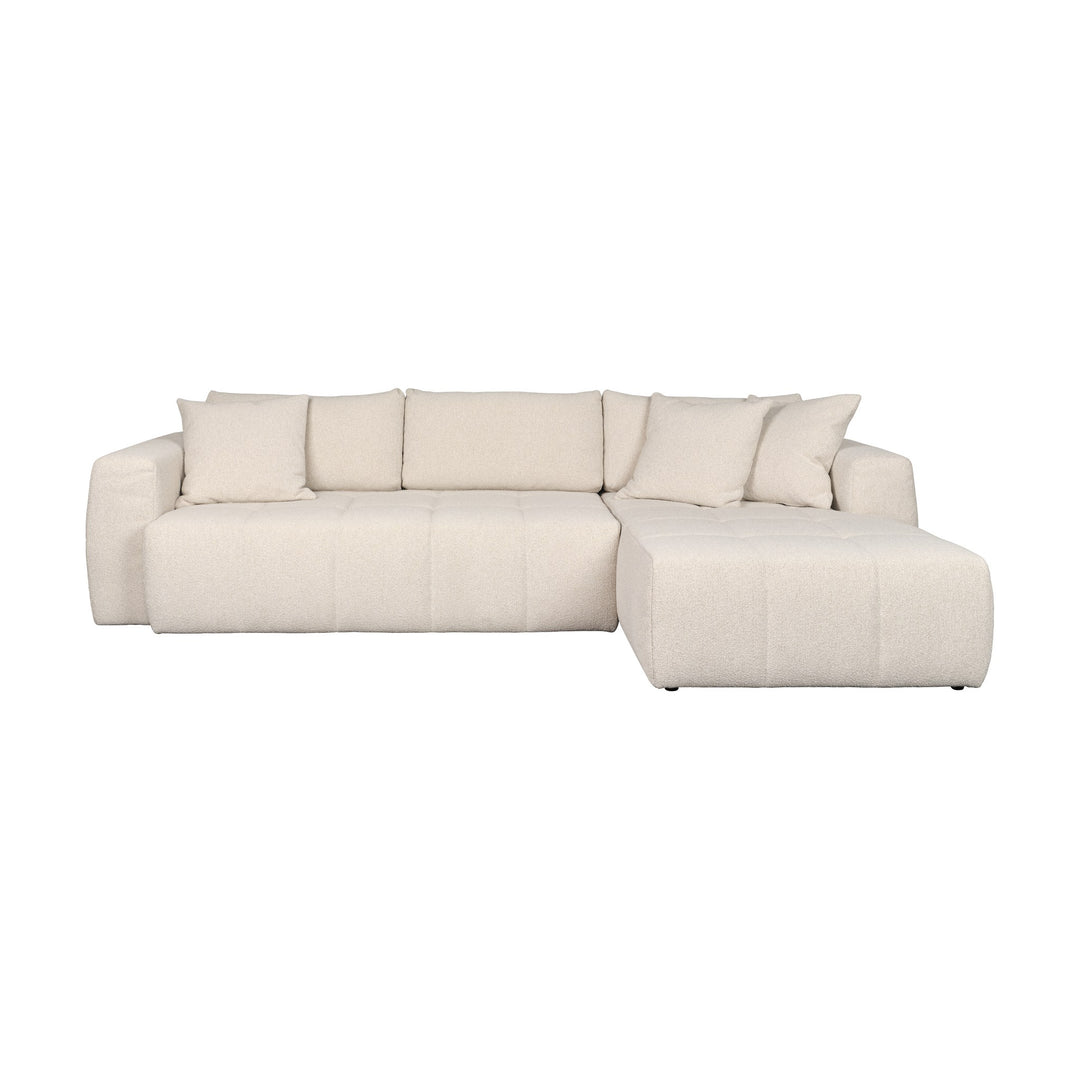 Hovden Fantasy sovesofa i beige bouclé med sjeselong og pynteputer, sett forfra.