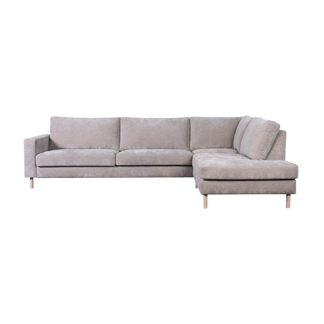 Hovden Bergamo sofa i terrakotta, 3-seter med åpen ende, sett fra siden mot hvit bakgrunn
