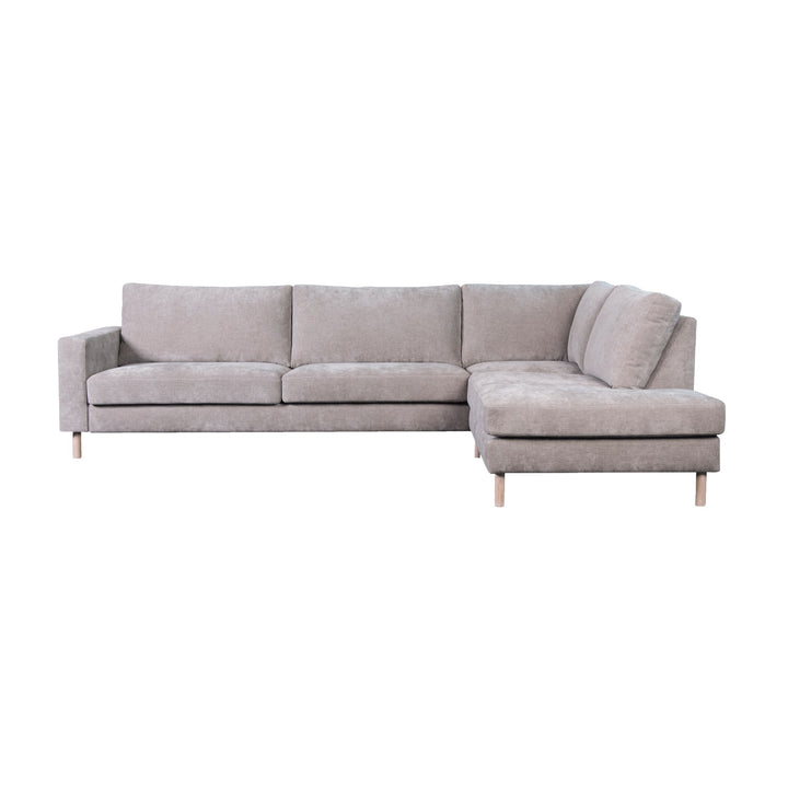 Hovden Bergamo sofa i terrakotta, 3-seter med åpen ende, sett fra siden mot hvit bakgrunn