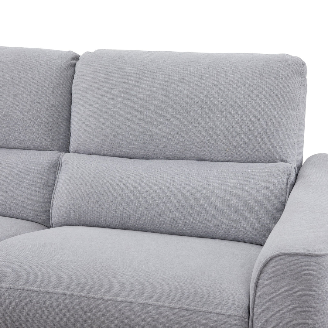 Nice sofa, nærbilde av lys grått stoff i rygg- og setehjørne