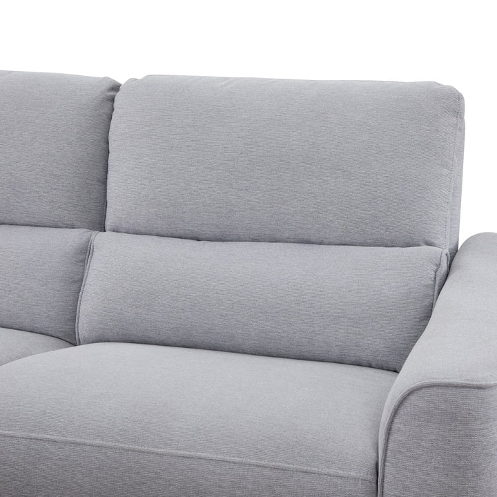 Nice sofa, nærbilde av lys grått stoff i rygg- og setehjørne