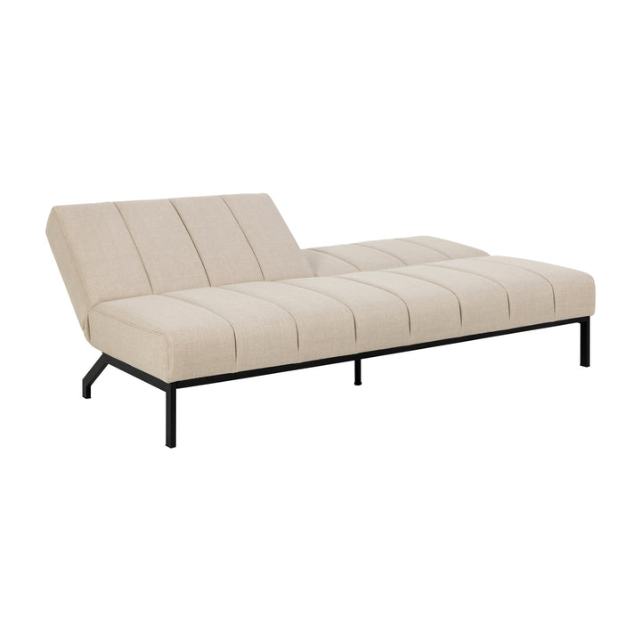 Caix sovesofa i beige stoff med delvis nedfelt rygg på svart metallramme