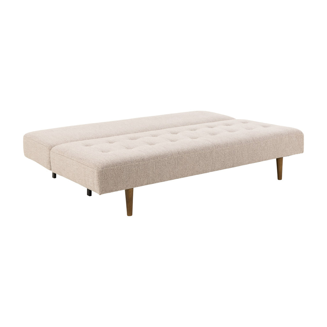 Blain sovesofa i beige bouclé slått ut til seng, med koniske treben