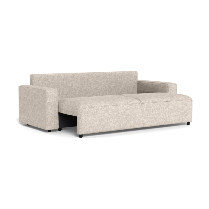 Vento sovesofa i beige chenille trukket delvis ut til seng, sett skrått