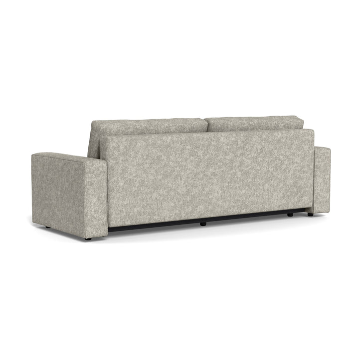 Vento sovesofa i lys grå chenille, sett fra siden og bak mot hvit bakgrunn