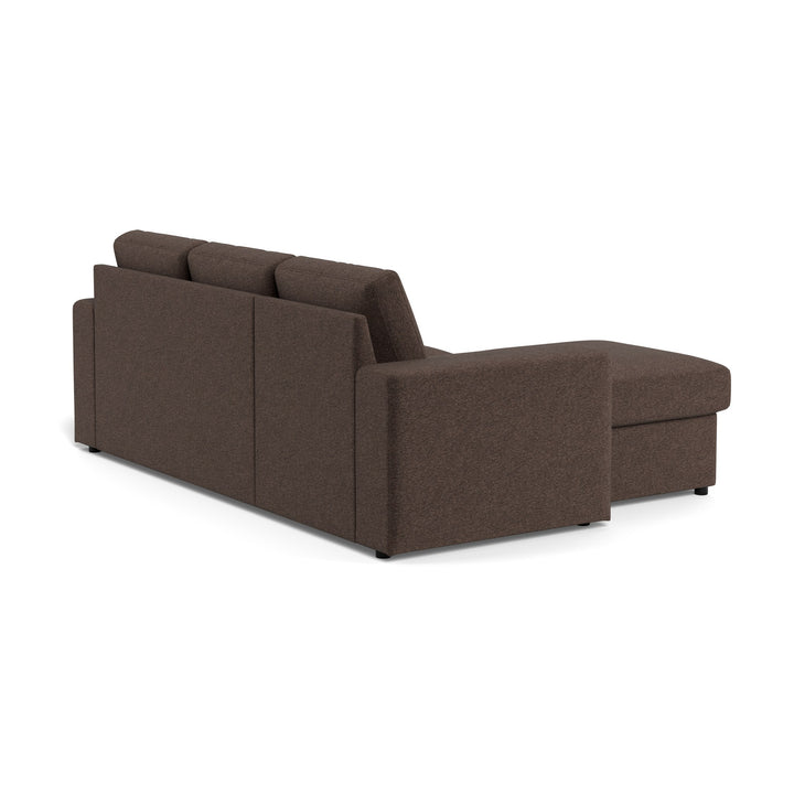 Conan sovesofa i mørkebrunt stoff med sjeselong, sett skrått bakfra