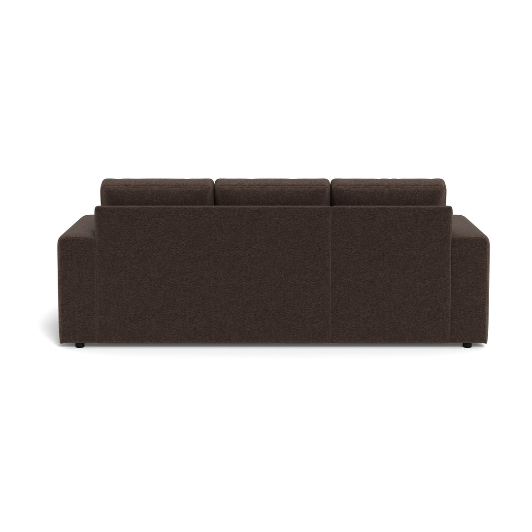 Conan sovesofa i mørkebrun stoff sett bakfra