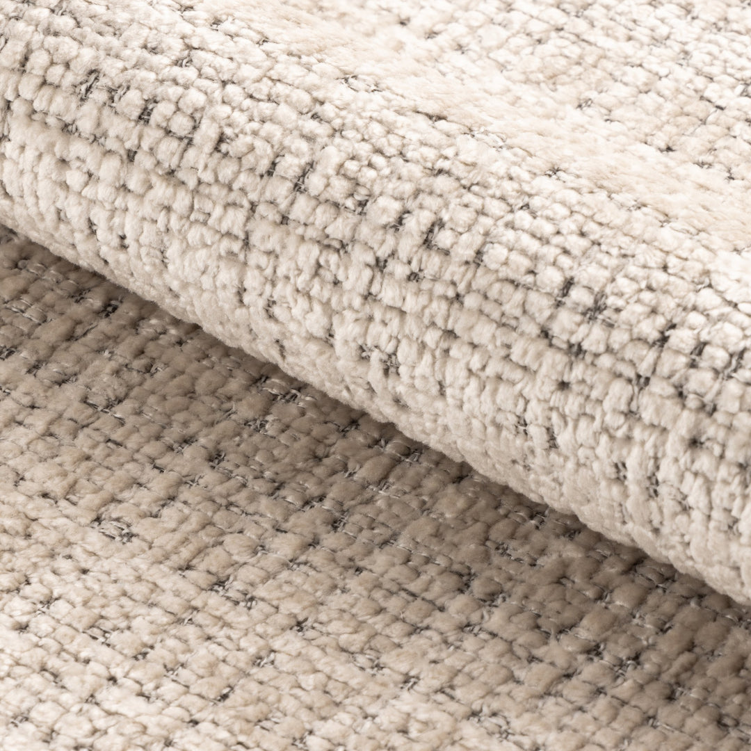 Lodi sofa, nærbilde av lys beige bouclé-tekstil