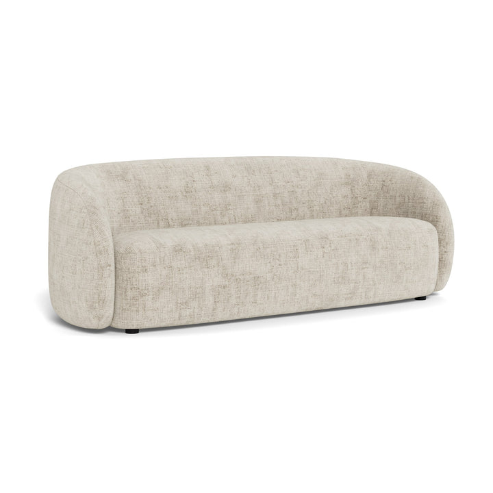 Lodi sofa i lys beige stoff med avrundet design og sorte ben