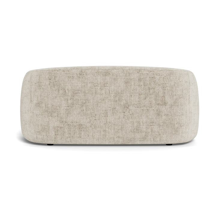 Lodi sofa i lys beige bouclé, sett fra siden