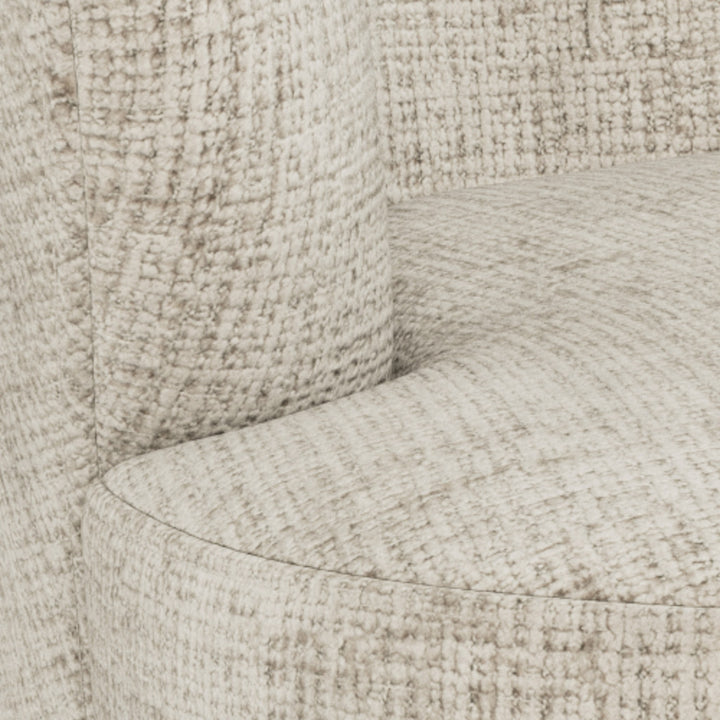 Darlene lounge stol, nærbilde av buet rygg og sete i beige chenille