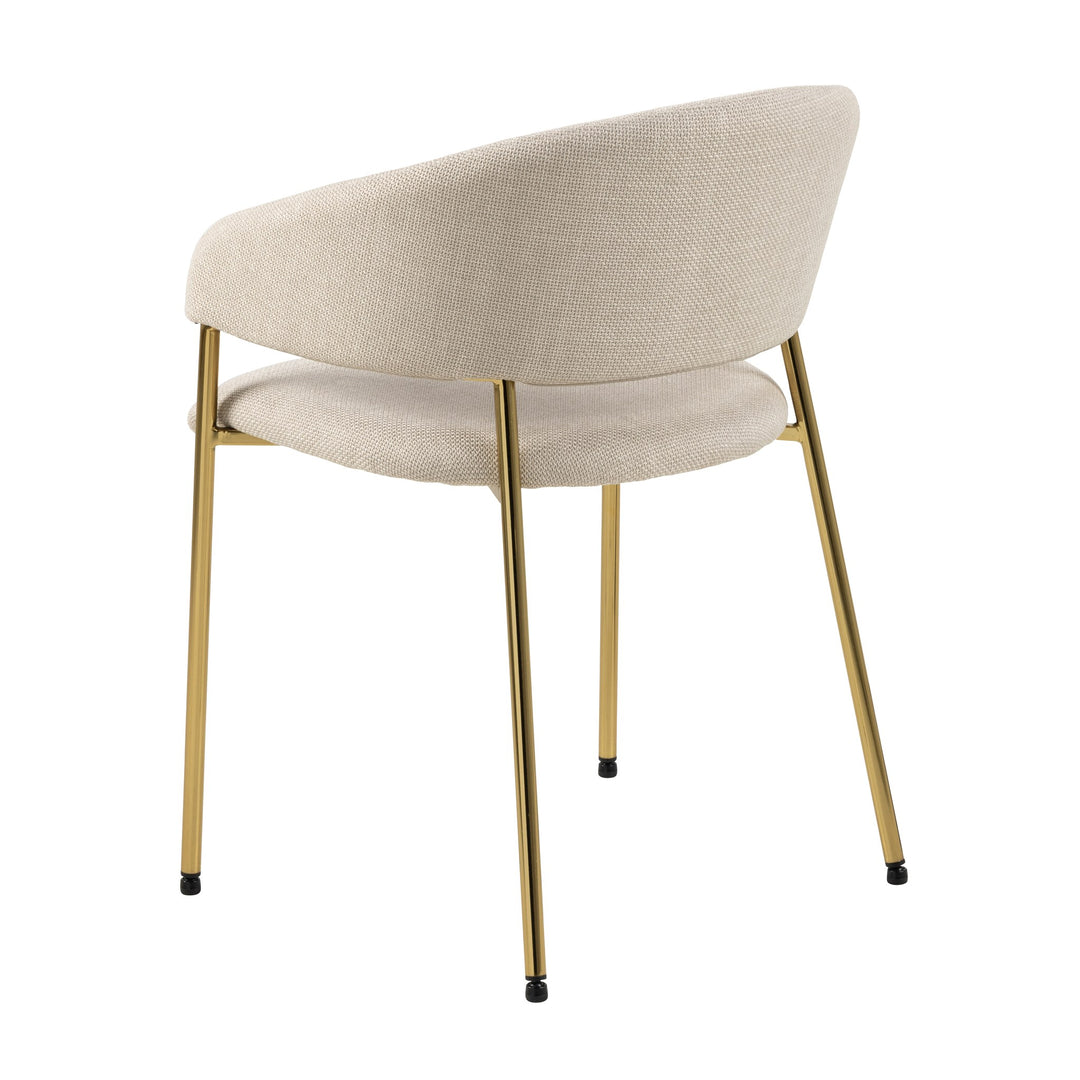 Ann spisestol i beige med gullben, sett skrått bakfra mot hvit bakgrunn