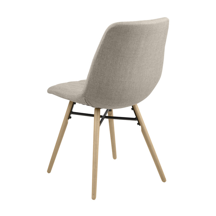 Lif spisestol i beige stoff, sett skrått bakfra med lyse koniske trebein