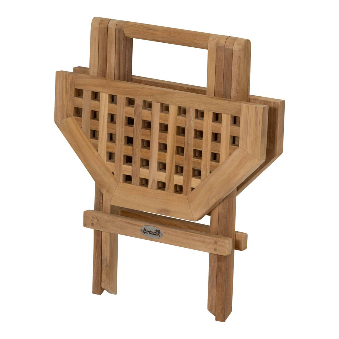 Hartman Skagen sammenleggbart sidebord i lyst teaktre med gitterplate, sammenslått på hvit bakgrunn