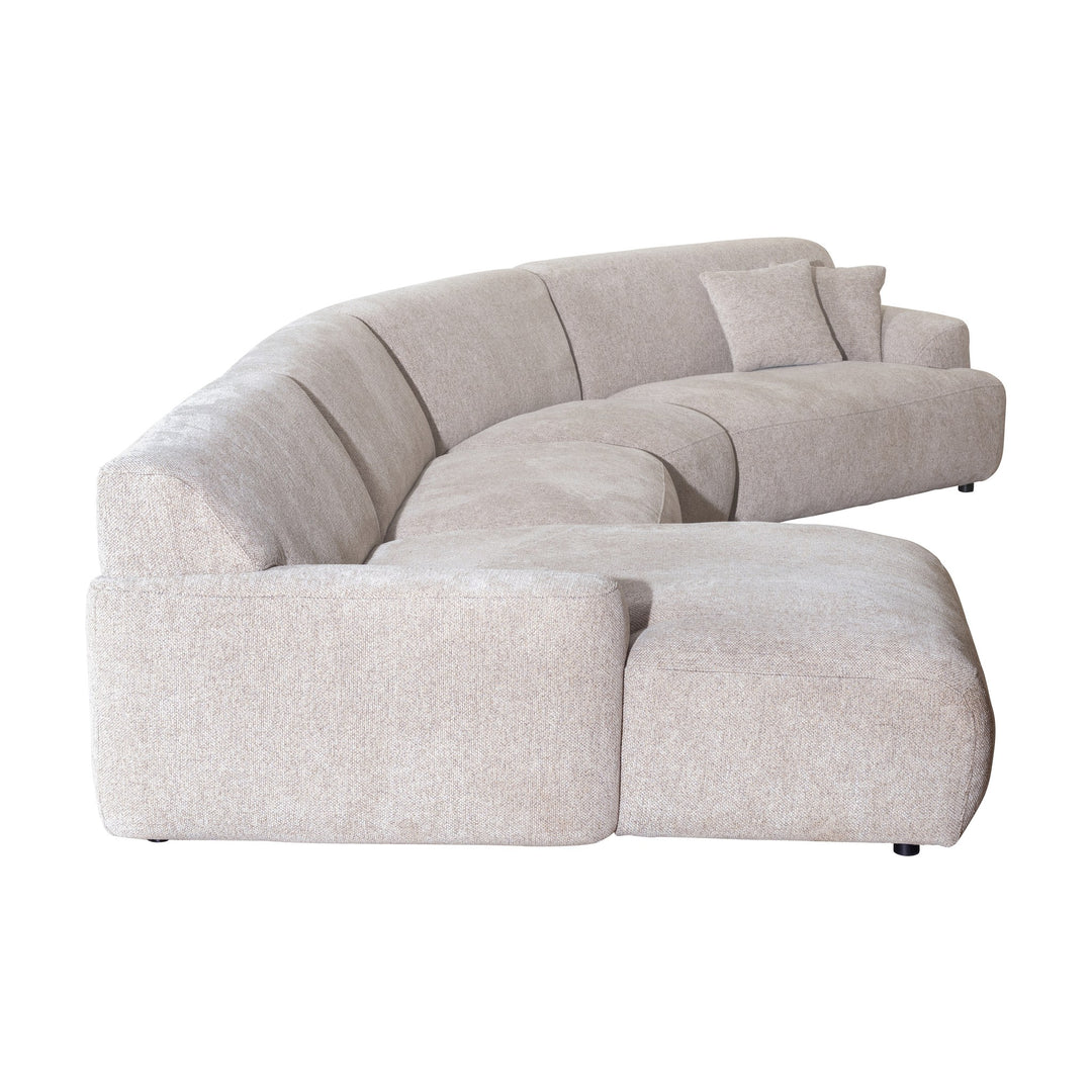 Maldini modulsofa i lys beige stoff, hjørnesofa med sjeselong, sett skrått fra siden