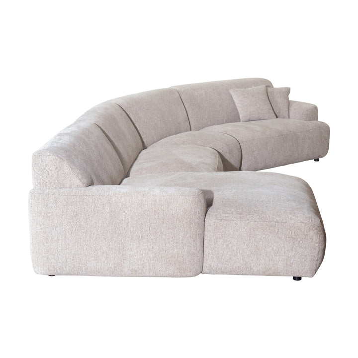 Maldini modulsofa i lys beige stoff, hjørnesofa med sjeselong, sett skrått fra siden