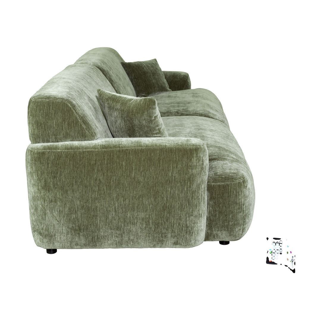 Maldini modulsofa i olivengrønn melert stoff med puter, sett fra siden mot hvit bakgrunn.