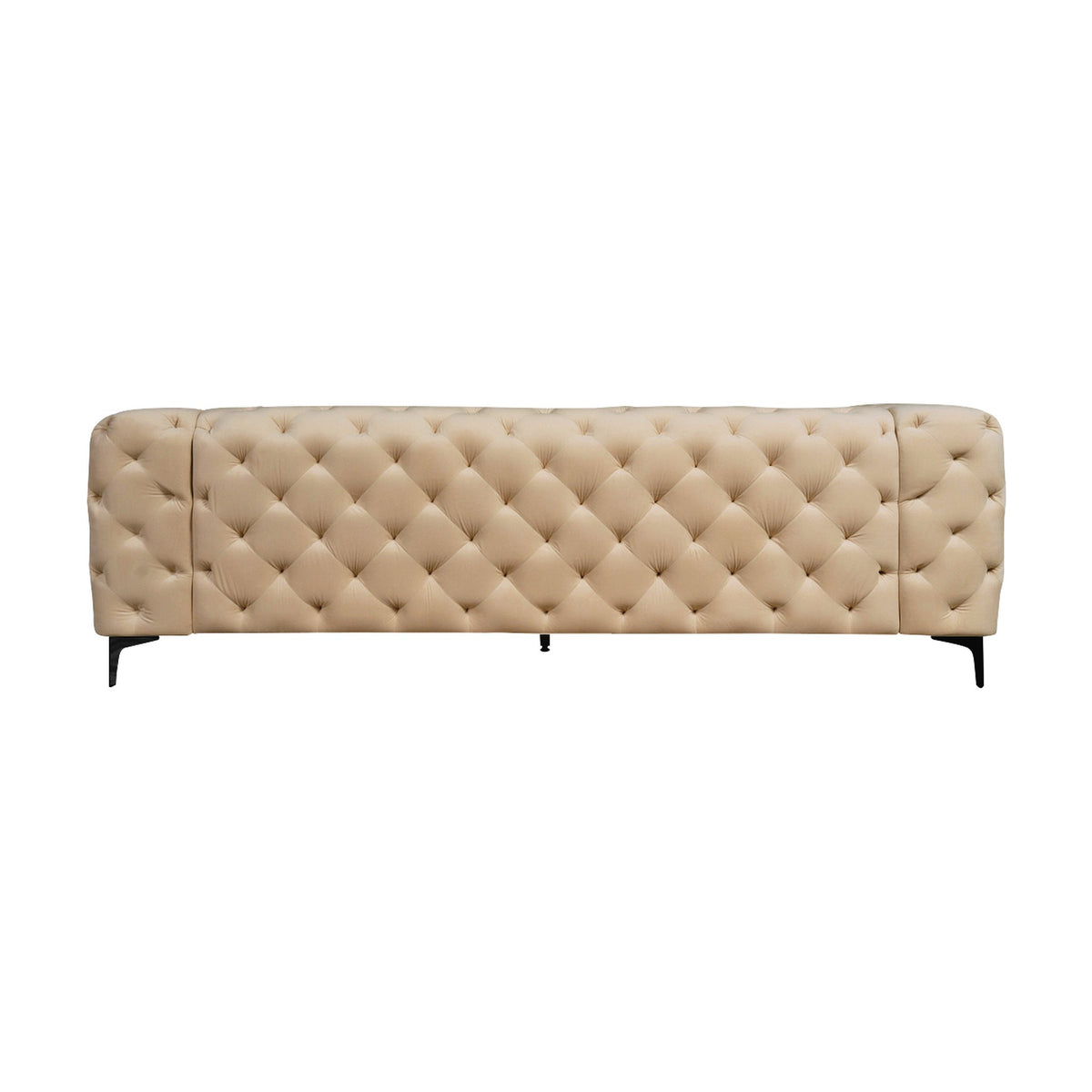 Bella sofa i beige tuftet velur med sorte ben, sett forfra mot hvit bakgrunn.