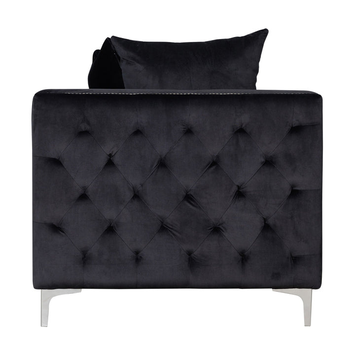 Dallas sofa, sort toseter i velur sett fra siden med knapptuftet panel, mot hvit bakgrunn
