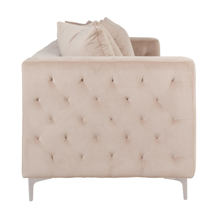 Boston sofa i beige velur, 3-seter med rutetuftet side og krombein, sett fra siden.