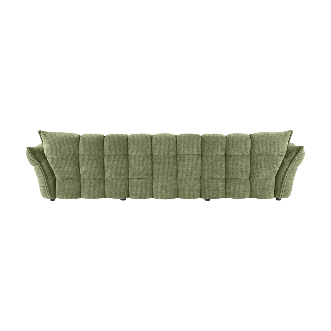 Marigold sofa i grønt sett bakfra, med rutet quiltet rygg og mørke ben.