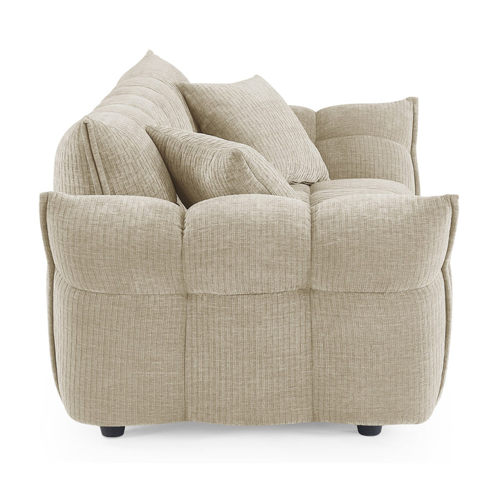 Marigold sofa i beige kordfløyel, sidevisning av pløset rygg og rullet armlene
