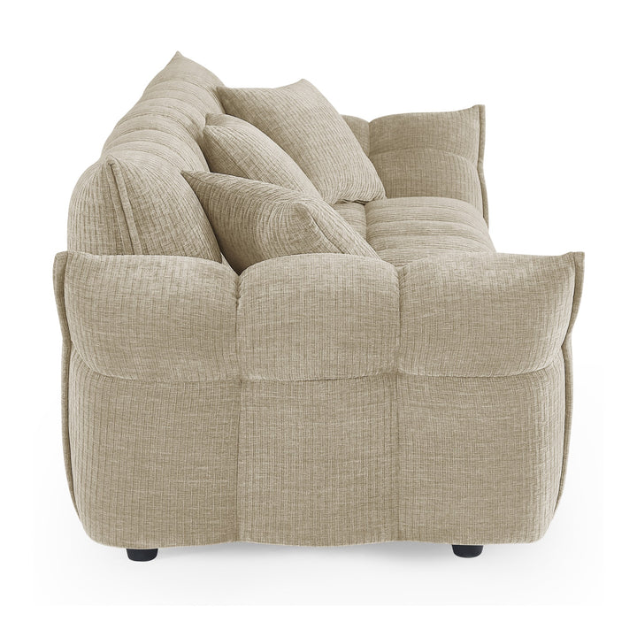 Marigold sofa i beige kordfløyel, sidevisning av pløset rygg med høye armlener