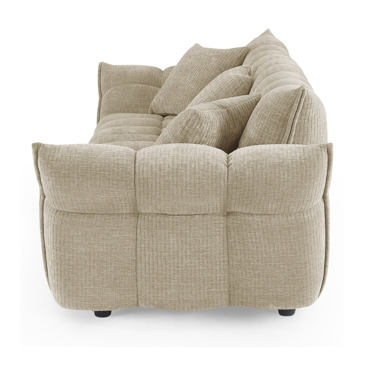 Marigold sofa i beige kordfløyel, sidevisning med dype pløsede seksjoner