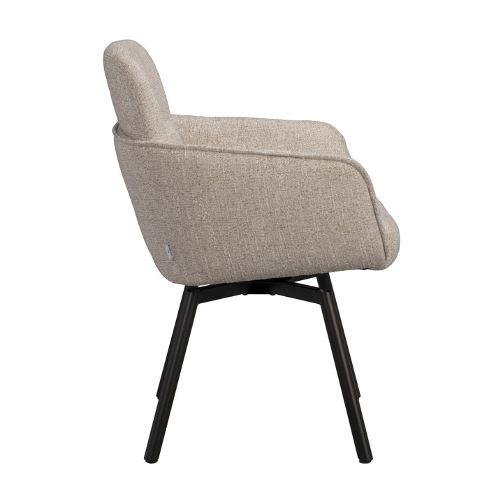 Rowico Roswell spisestol i lys beige melert stoff med svarte metallben, sett fra siden